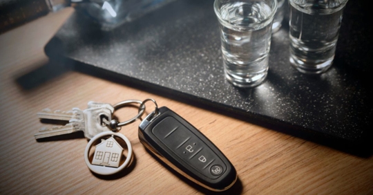 keys on bar next to shots